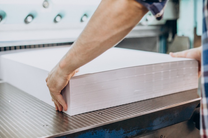 A large stack of paper during sign production