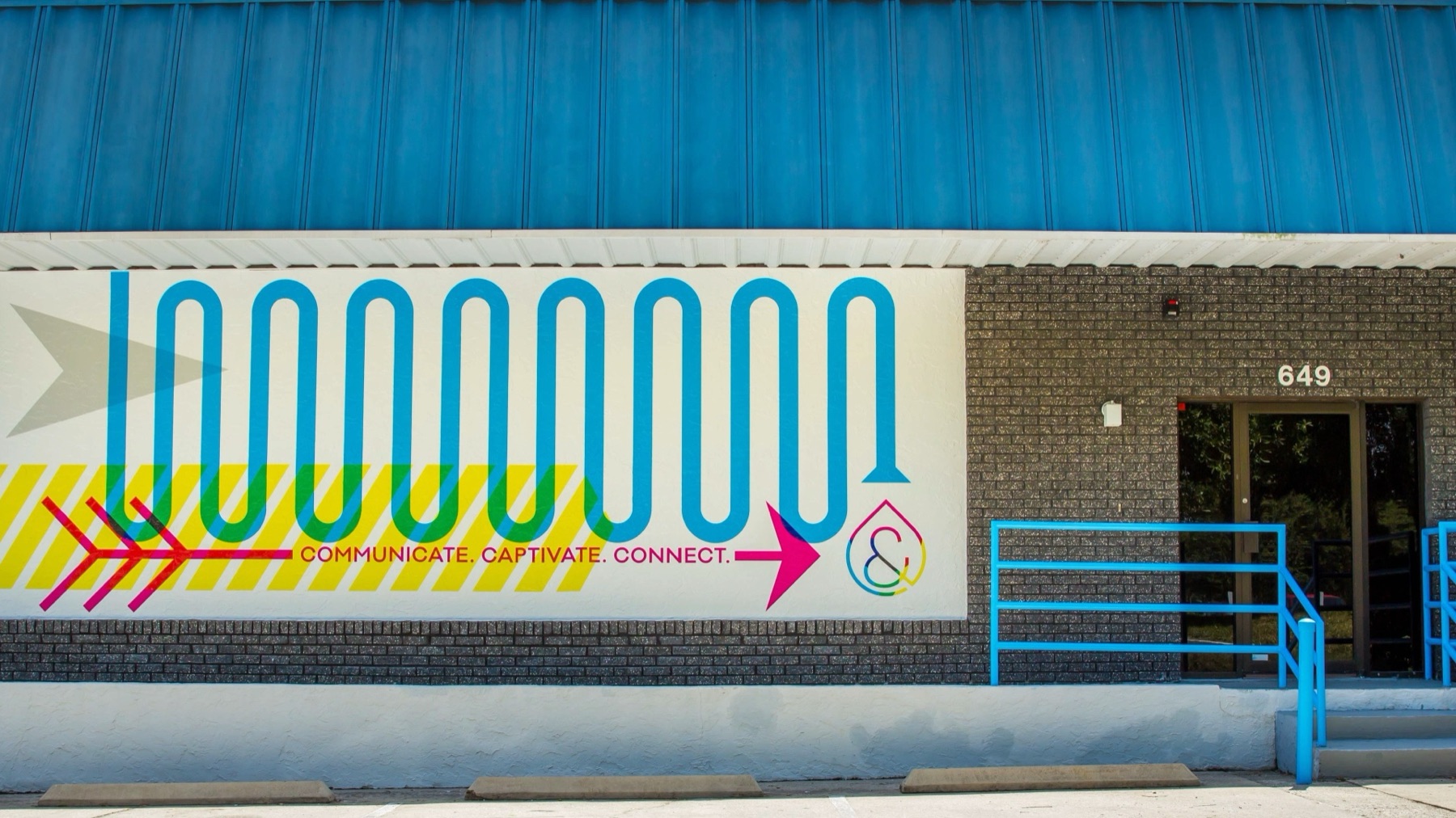 The Lawton Connect plant on Triumph Court, with the Communicate Captivate Connect wall graphic beside the entrance