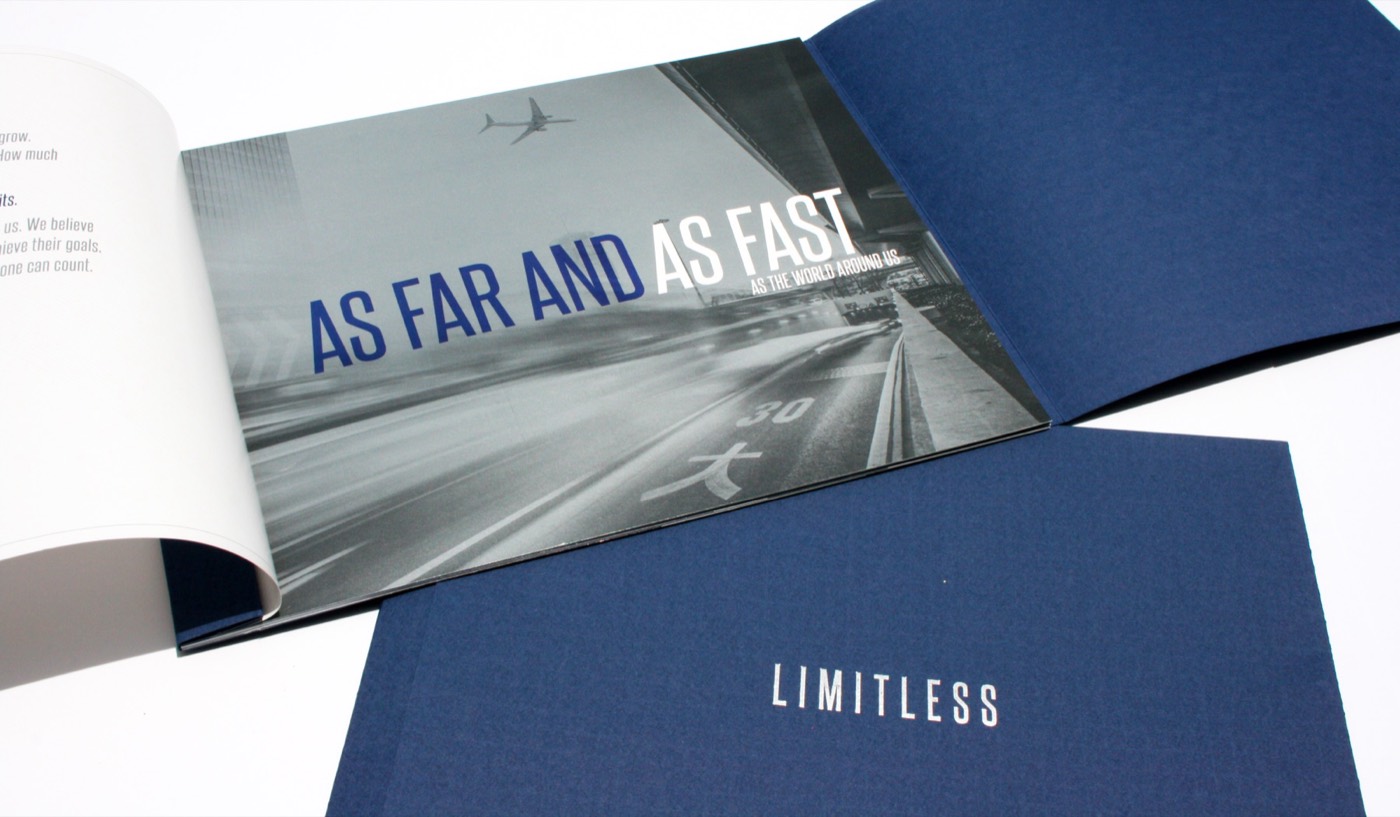 A navy book open to a two-page spread
