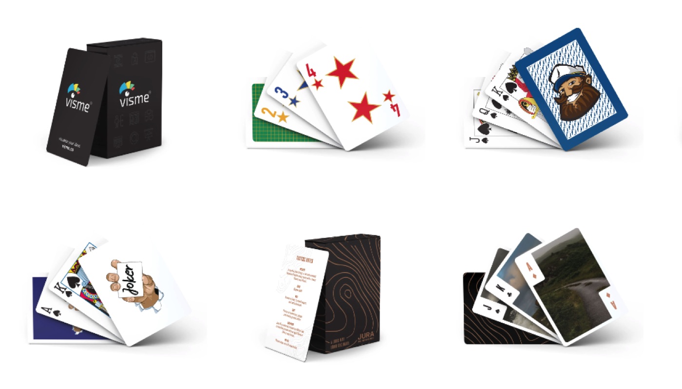 Six custom decks of playing cards with printed tuck boxes
