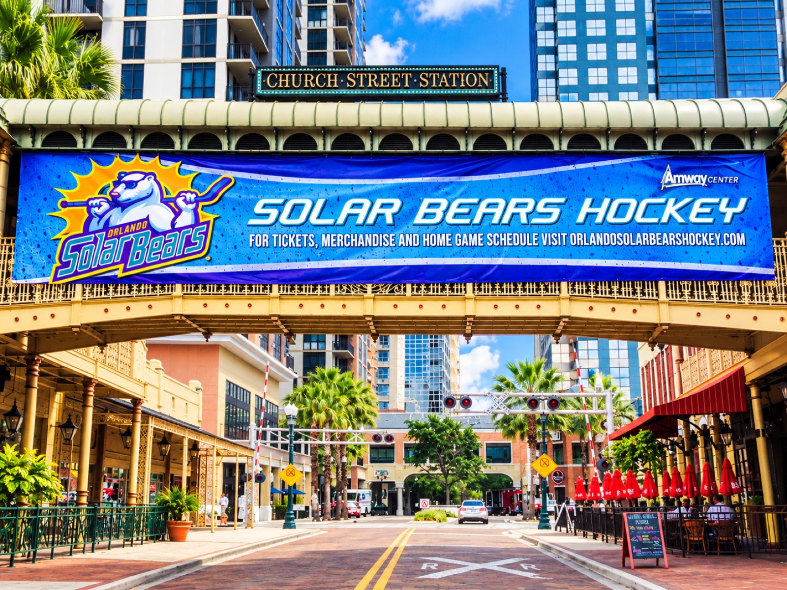 A Solar Bears hockey banner spanning the Church Street Station bridge in downtown Orlando